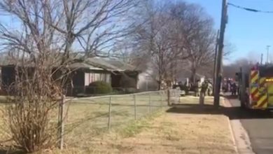 Photo of Joplin firefighters battle Saturday residential fire