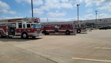 Photo of Area fire departments helping host American flags for fallen officer
