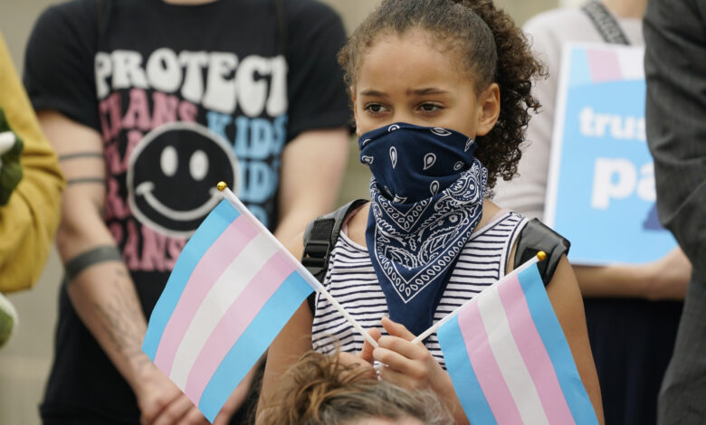 Transgender trans care rights flag flags minor GOP lead puppetry blockers