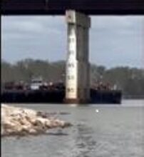 Photo of Barge hits bridge south of Sallisaw Oklahoma Saturday; only superficial damage reported