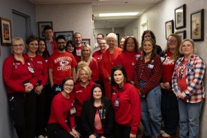 Paula Baker And Staff Wear Red