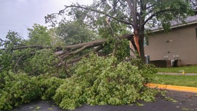 Photo of Pittsburg City Manager Daron Hall talks storm damage