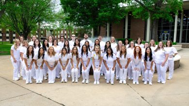Photo of NEO honors 51st Nursing class with traditional pinning ceremony