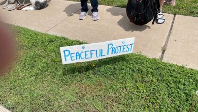 Photo of Group gathered at Burlison’s office for protest, school supply drive
