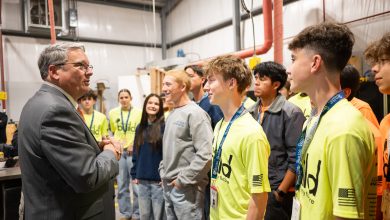 Photo of Pitt State and Bentonville program sign partnership for student scholarships